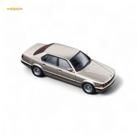 (Pre-Order) DCM BMW E32 7-Series Sedan Cashmere Beagle Gold 1:64