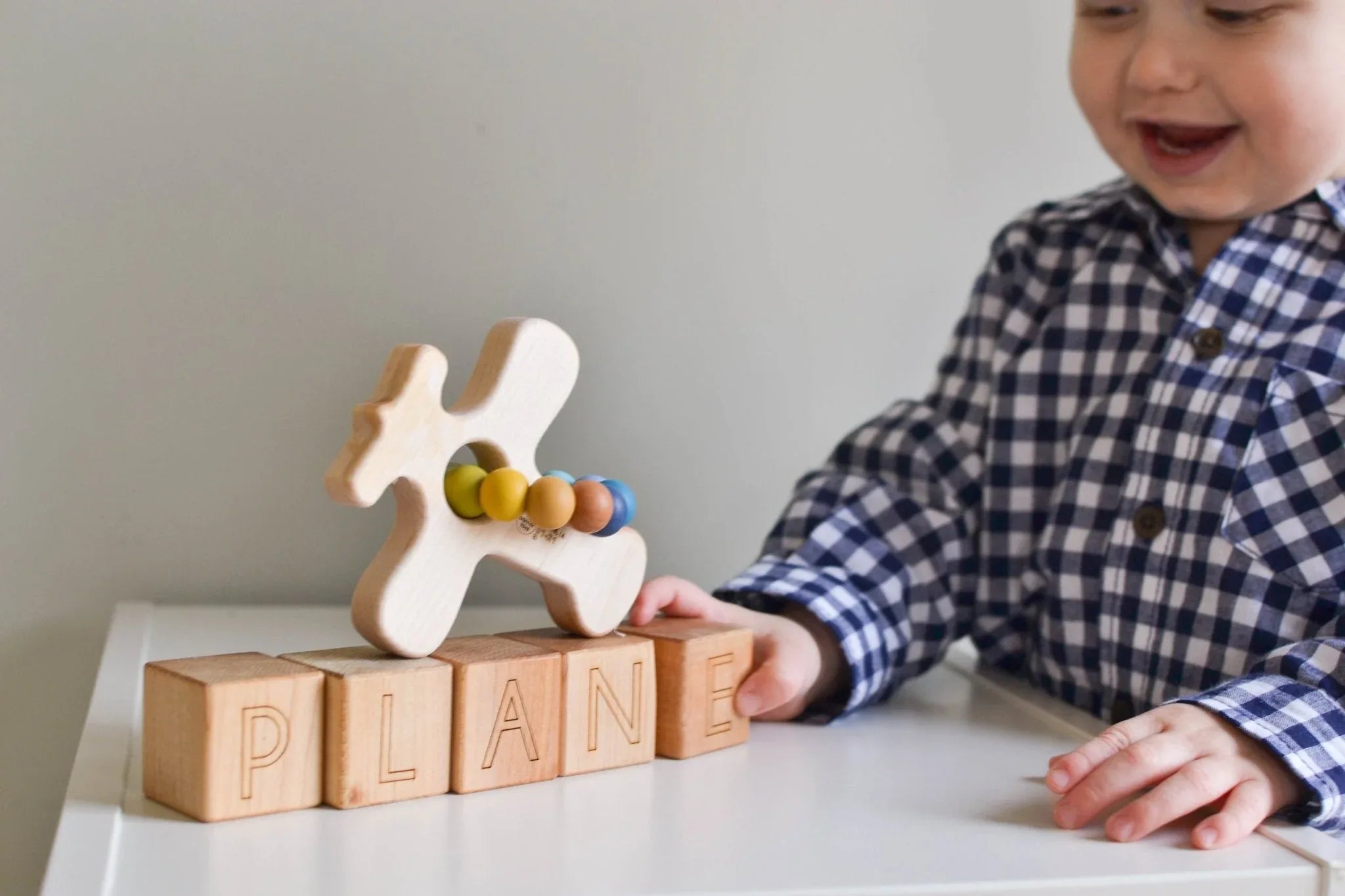 Airplane Wood Grasping Toy With Teething Beads - BIG FRENCHIES