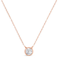 AGS Certified 10K Rose Gold 1/5 Cttw Bezel Set Round Diamond Solitaire 16-18" Adjustable Pendant Necklace (H-I Color, VS1-VS2 Clarity)