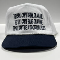 They say I can’t drink on a plane they say I can’t bang on a plane on a white crown navy brim SnapBack hat cap custom embroidered