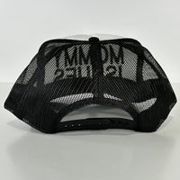 Mommy Issues on a black and white mesh trucker SnapBack cap hat custom embroidered