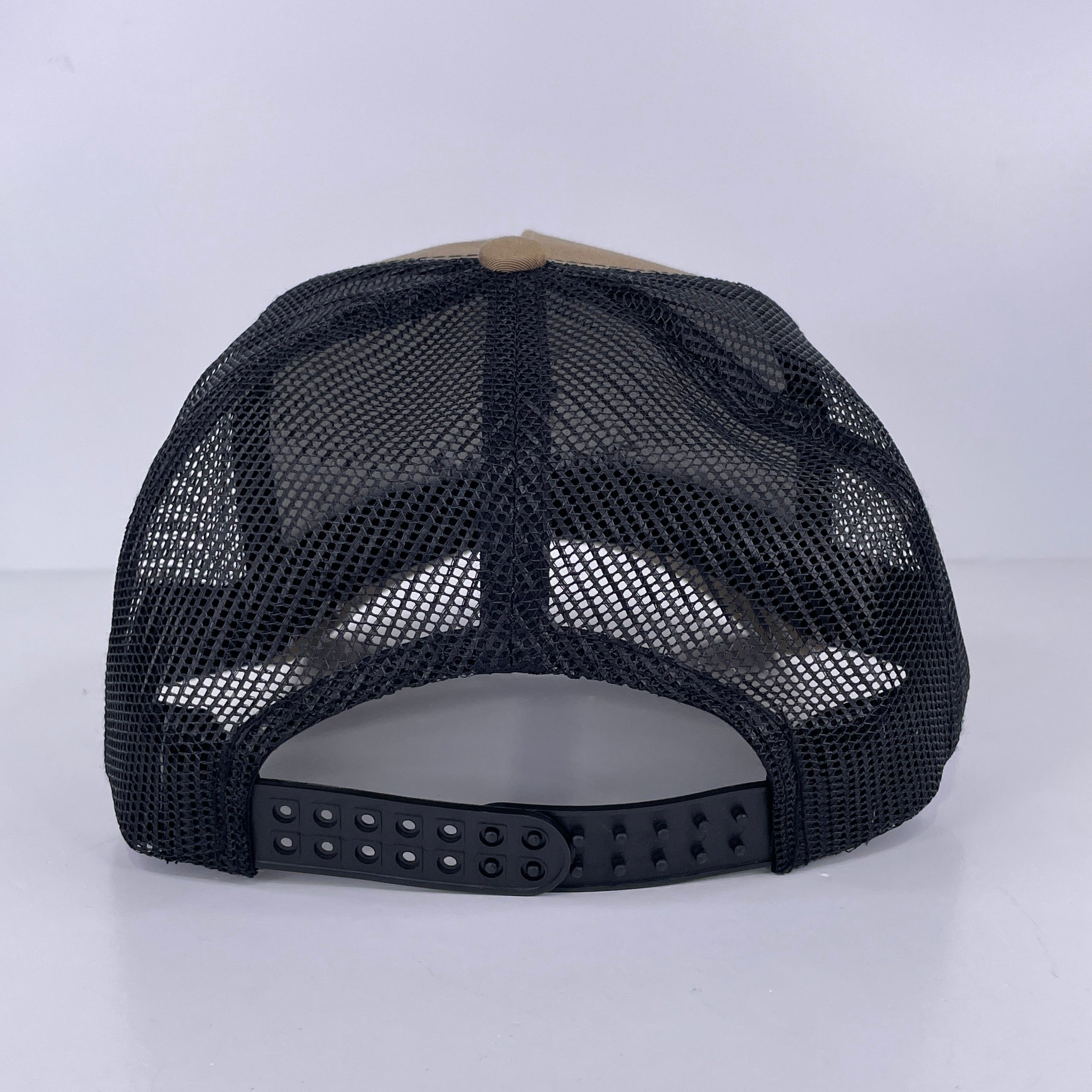 Juggernaut Outdoors Custom Embroidered tan and black mesh trucker SnapBack