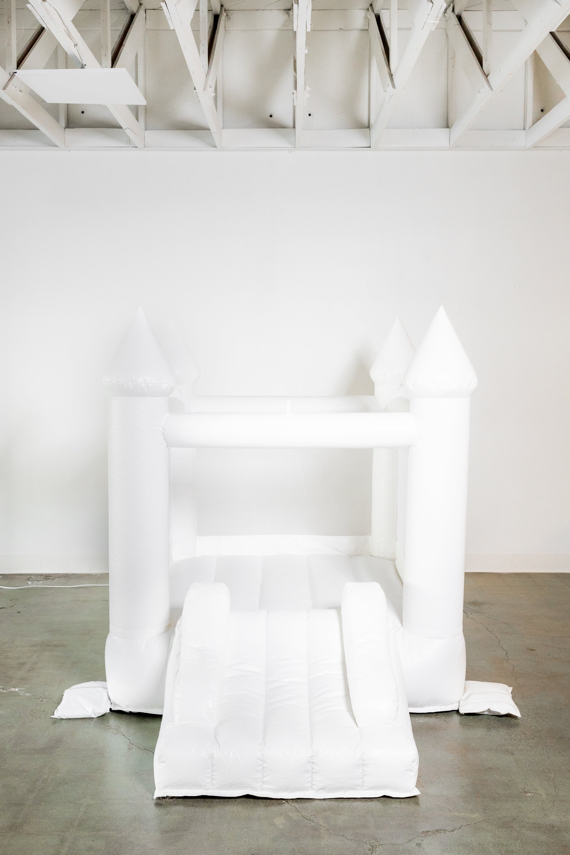 Mini Ava - White Bounce House with Cone Tops