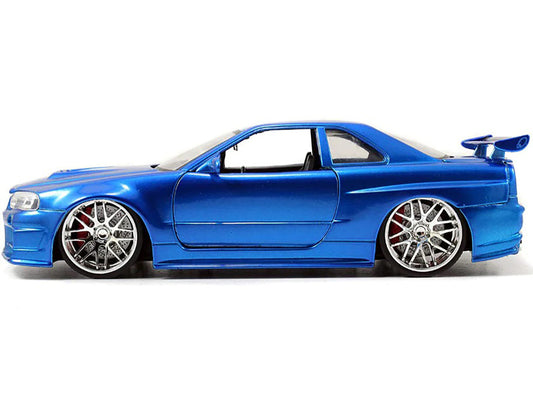 Brian's Nissan GTR Skyline R34 RHD (Right Hand Drive) Blue 25th Anniversary "Fast & Furious" Movie 1/24 Diecast Model Car by Jada