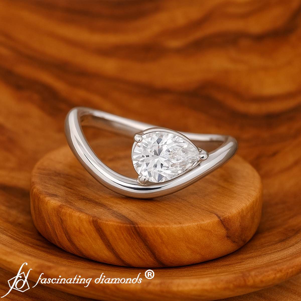 Curve Wave Pear Shaped Solitaire Diamond Ring