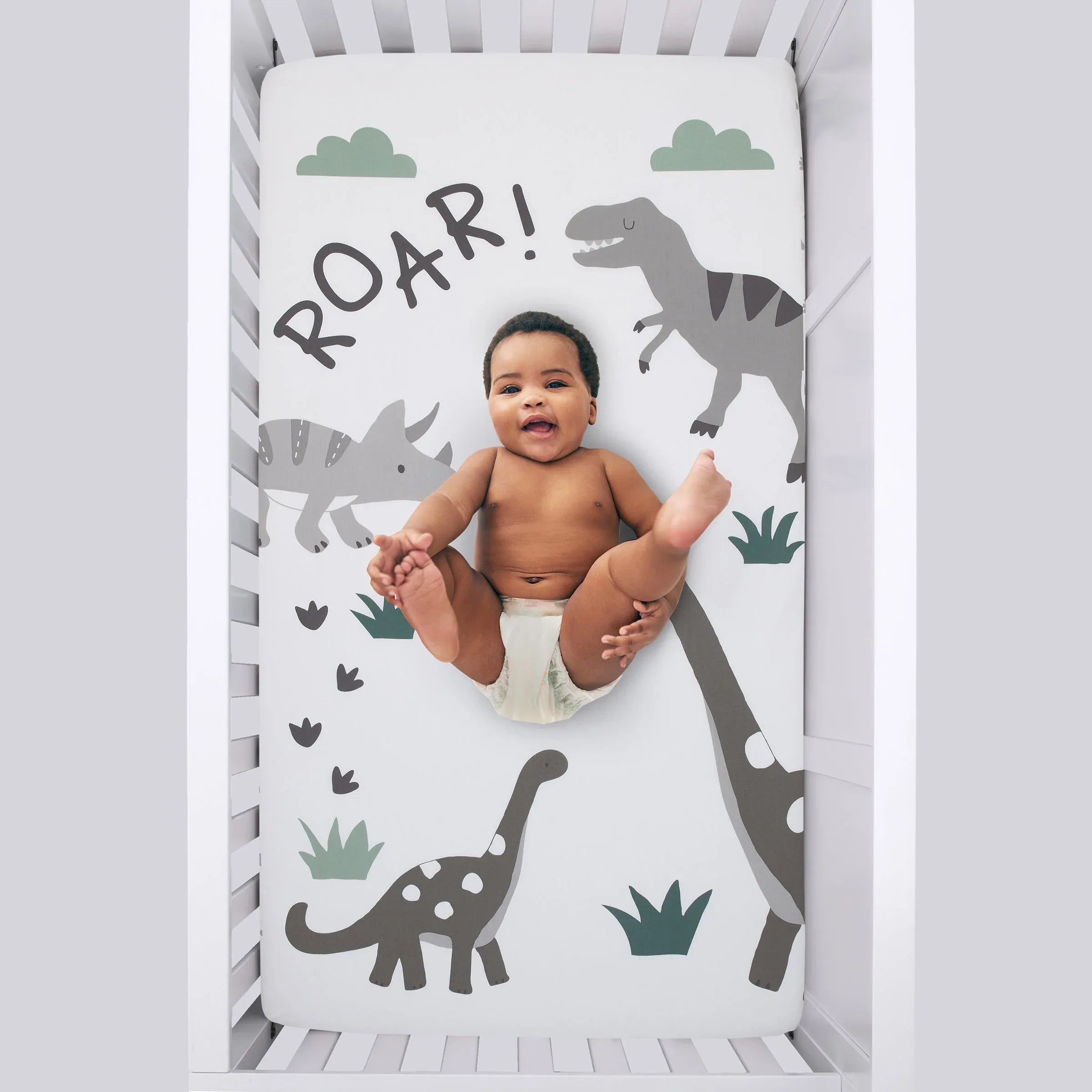 Baby-Saurus Photo Op ROAR White, Gray, and Green Dinosaur with Clouds Nursery Fitted Crib Sheet - BIG FRENCHIES
