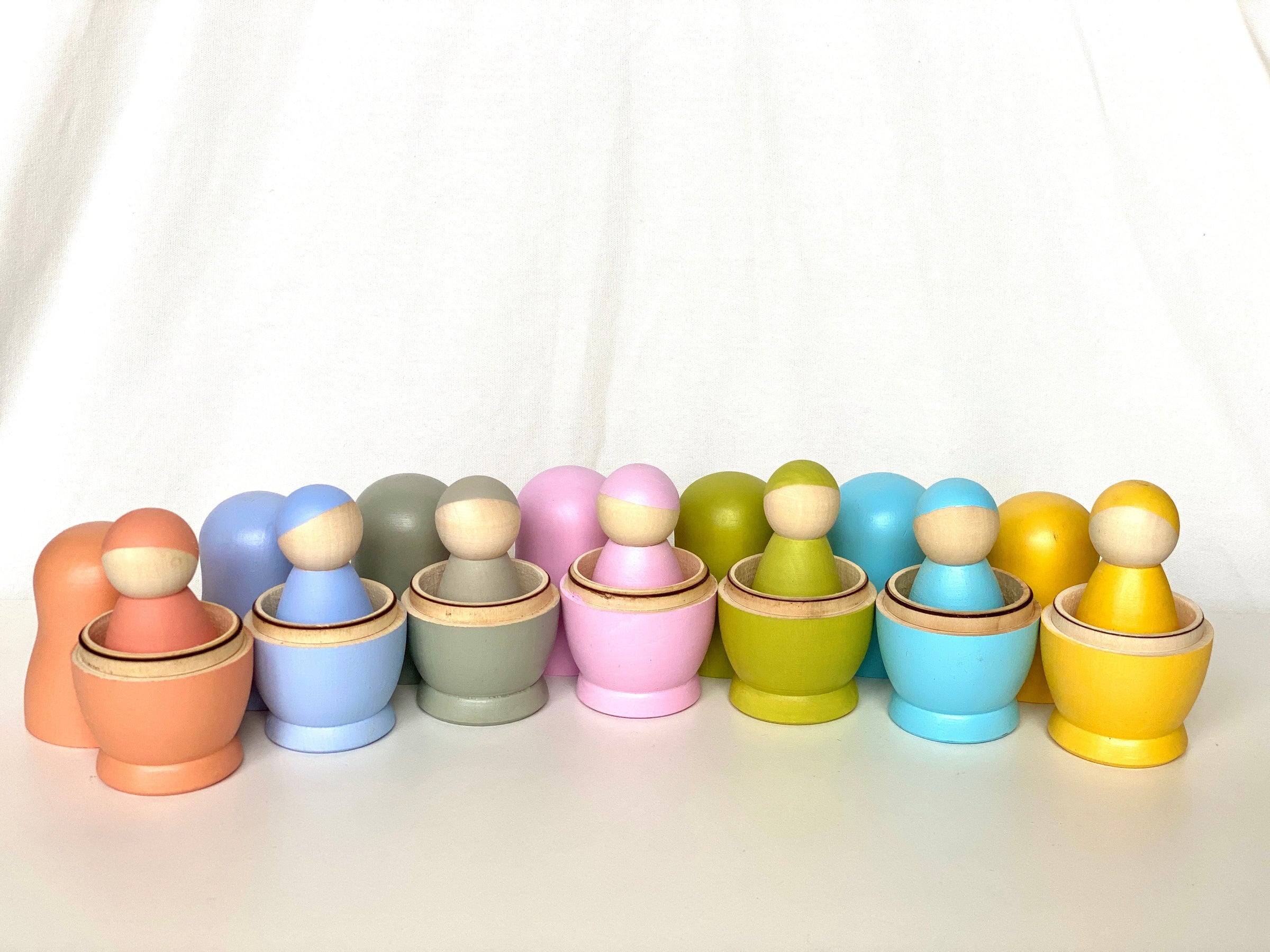 Wooden Nesting Dolls with Pegs Pastel