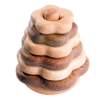 Wooden stacking toy in flower shape from 2 types of wood